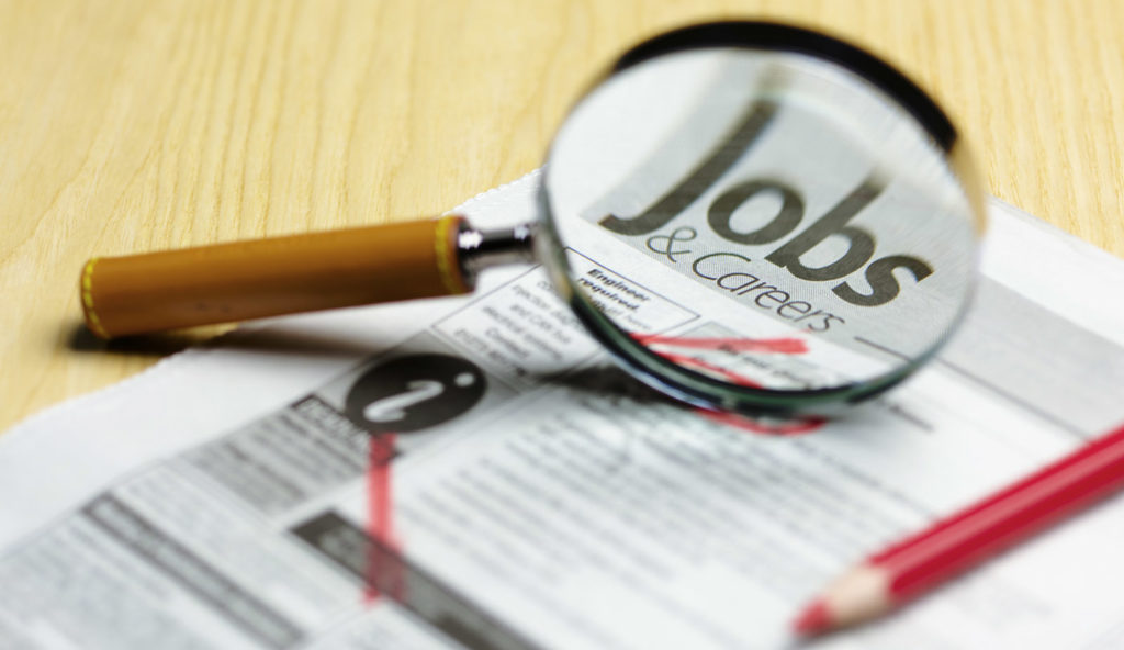 Magnifying glass on jobs/careers page.