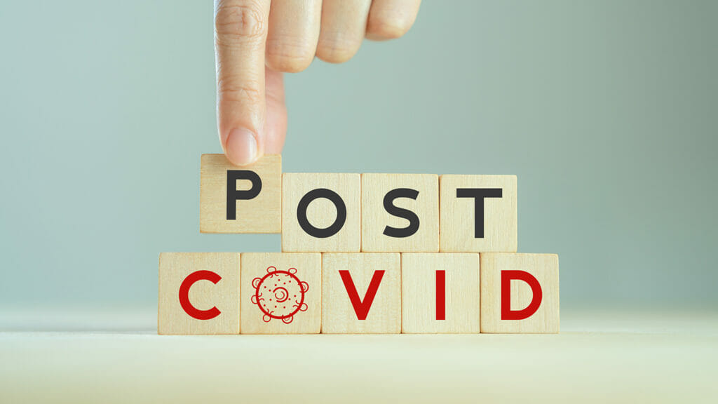 Post covid concept. Hope and the end. Long covid; long-term effects of coronavirus. Chronic fatigue, feeling tired easily. Medical, treatment long covid symstoms, recovery tips. Wooden cube blocks.