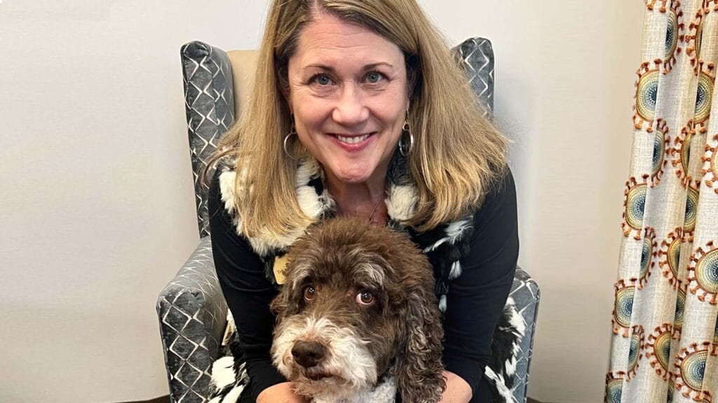 Roodle the Labradoodle brings oodles of love to residents